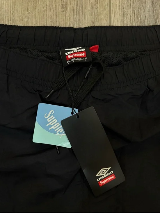 Umbro Black Track Pants with White Panels and Supreme Branding - Picture 4 of 4